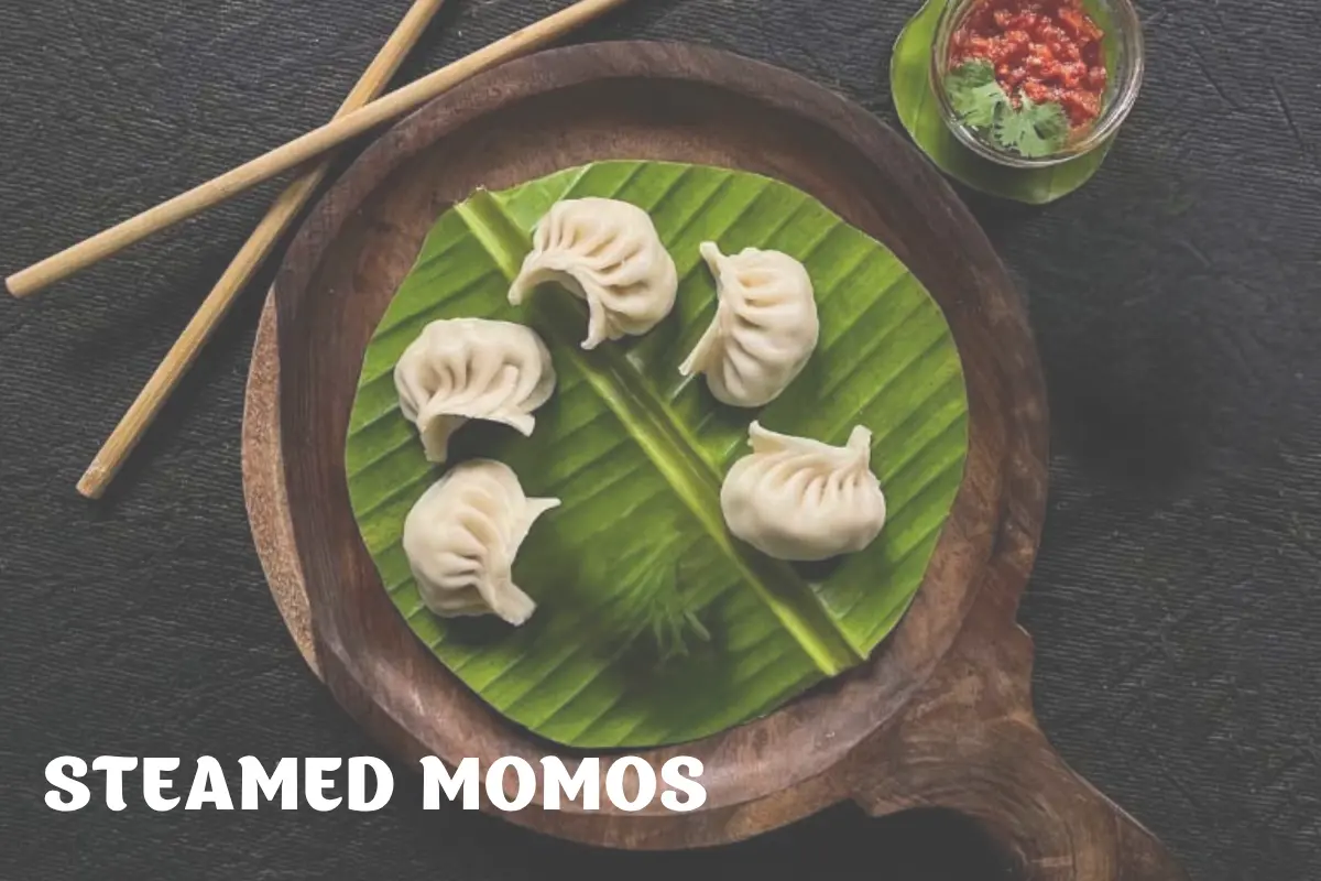 Chai Kings steamed veg momos on a banana leaf
